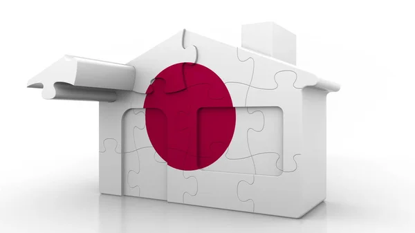 Bâtiment maison puzzle mettant en vedette le drapeau du Japon. Émigration japonaise, construction ou marché immobilier conceptuel rendu 3D — Photo