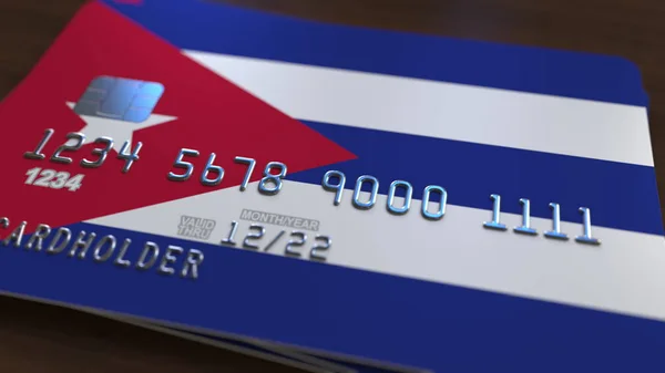 Plastic bank card featuring flag of Cuba. Cuban banking system conceptual 3D rendering — Stock Photo, Image