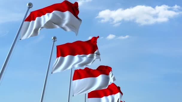 Mávali vlajkami Indonésie proti obloze, loopable 3d animace — Stock video