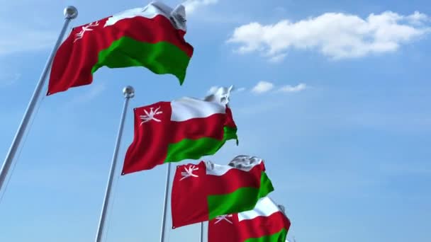 Размахивание флагами Омана против неба, зацикленная 3D анимация — стоковое видео