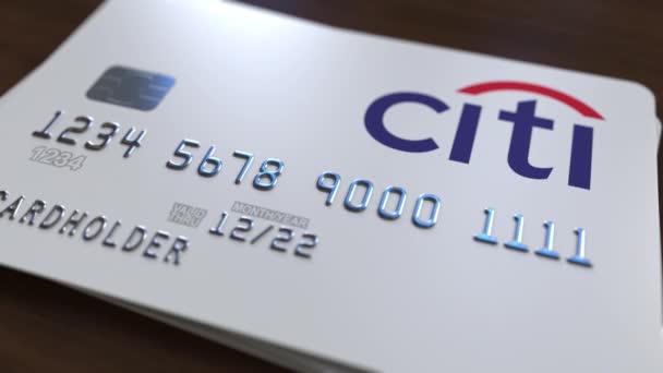 Plast bankkort med logotypen för Citibank. Redaktionella konceptuell 3d-animering — Stockvideo