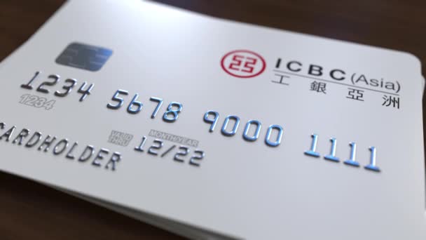 Plastic card with logo of Industrial and Commercial Bank of China ICBC. Editorial conceptual 3D animation — Stock Video