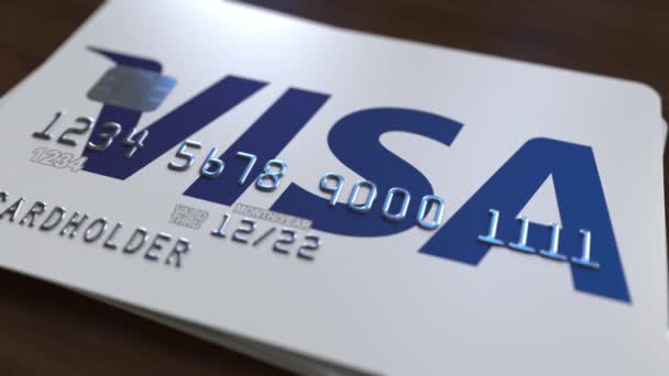 Пластиковая карта с логотипом Visa Inc. Редакционная концептуальная 3D анимация — стоковое видео