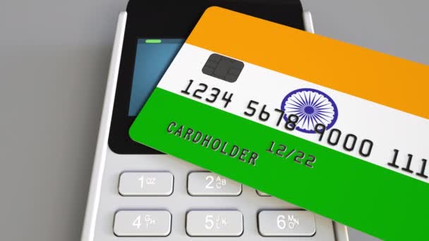 Terminal de pago o punto de venta con tarjeta de crédito con bandera de India. India comercio al por menor o sistema bancario animación conceptual — Vídeo de stock