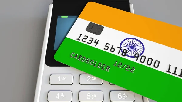 Payment or POS terminal with credit card featuring flag of India. Indian retail commerce or banking system conceptual 3D rendering — Stock Photo, Image