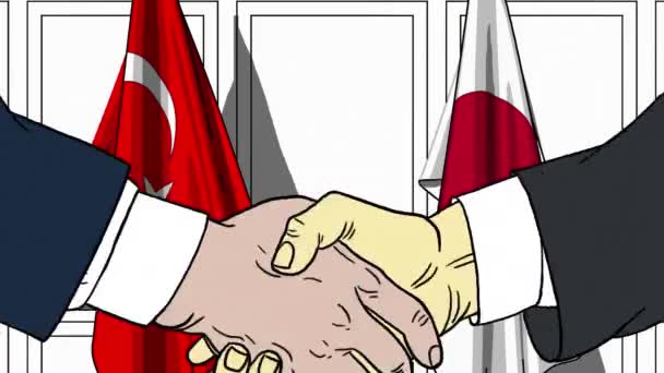 Geschäftsleute oder Politiker schütteln Hände gegen Flaggen der Türkei und Japans. Treffen oder Zusammenarbeit im Zusammenhang mit Zeichentrickfilmen — Stockvideo