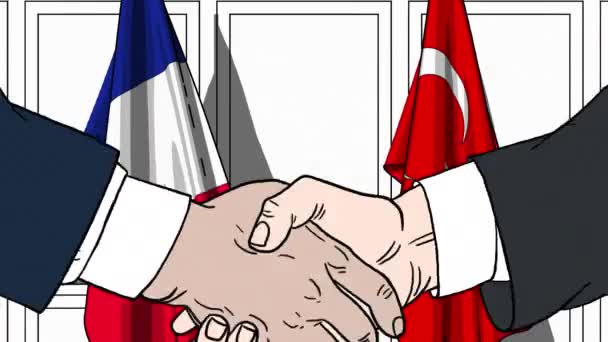 Empresarios o políticos estrechando las manos contra las banderas de Francia y Turquía. Animación de dibujos animados relacionados con reuniones o cooperación — Vídeo de stock