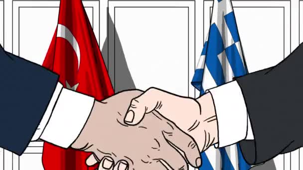 Geschäftsleute oder Politiker schütteln Hände gegen Flaggen der Türkei und Griechenlands. offizielles Treffen oder Zusammenarbeit im Zusammenhang mit Zeichentrickfilmen — Stockvideo