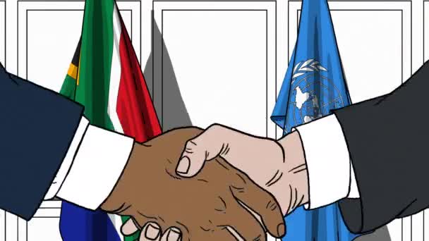 Geschäftsleute oder Politiker schütteln Hände gegen Flaggen südafrikanischer und vereinter Nationen. offizielles Treffen oder kooperationsbezogene redaktionelle Animation — Stockvideo