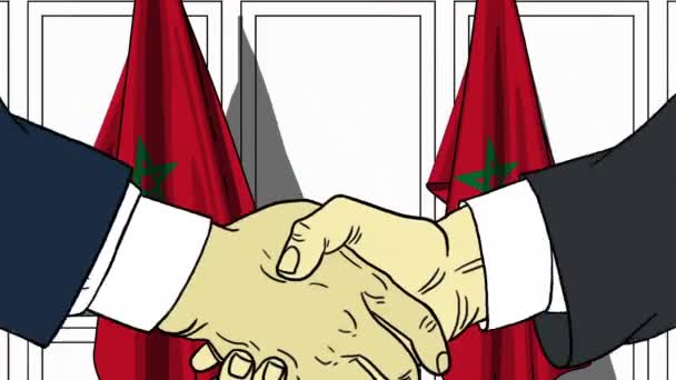 Businessmen or politicians shake hands against flags of Morocco. Official meeting or cooperation related cartoon animation — Stock Video