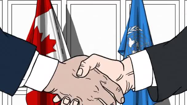 Empresarios o políticos se dan la mano contra las banderas de Canadá y las Naciones Unidas. Reunión oficial o animación editorial relacionada con la cooperación — Vídeos de Stock