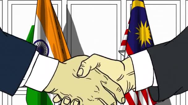 Uomini d'affari o politici stringono la mano contro le bandiere di India e Malesia. Riunione ufficiale o animazione animata correlata alla cooperazione — Video Stock