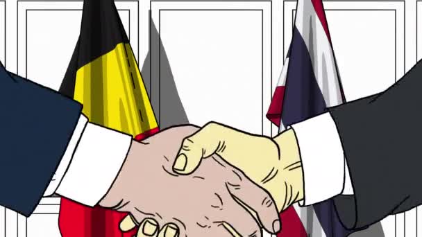 Empresarios o políticos se dan la mano contra las banderas de Bélgica y Tailandia. Reunión oficial o animación de dibujos animados relacionados con la cooperación — Vídeos de Stock