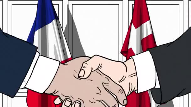 Des hommes d'affaires ou des politiciens serrent la main contre les drapeaux de la France et du Danemark. Réunion officielle ou animation de bande dessinée liée à la coopération — Video