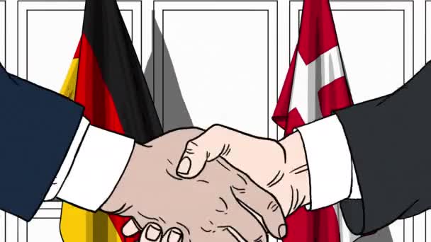 Uomini d'affari o politici stringono la mano contro le bandiere di Germania e Danimarca. Riunione ufficiale o animazione animata correlata alla cooperazione — Video Stock