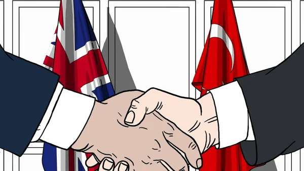 Des hommes d'affaires ou des politiciens serrant la main contre les drapeaux de Grande-Bretagne et de Turquie. Illustration de dessin animé liée à une réunion ou coopération — Photo