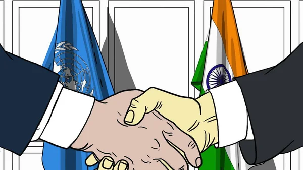 Businessmen or politicians shake hands against flags of United Nations and India. Official meeting or cooperation related editorial illustration — Stock Photo, Image