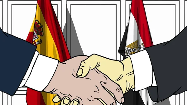 Uomini d'affari o politici stringono la mano contro le bandiere di Spagna ed Egitto. Riunione ufficiale o illustrazione dei cartoni animati relativi alla cooperazione — Foto Stock