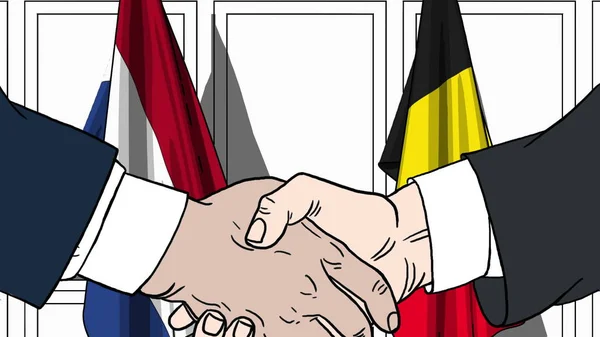 Uomini d'affari o politici stringono la mano contro le bandiere dei Paesi Bassi e del Belgio. Riunione ufficiale o illustrazione dei cartoni animati relativi alla cooperazione — Foto Stock