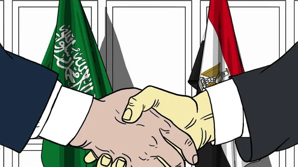 Бизнесмены или политики пожимают руку флагу Саудовской Аравии и Египта. Официальная иллюстрация встречи или сотрудничества — стоковое фото