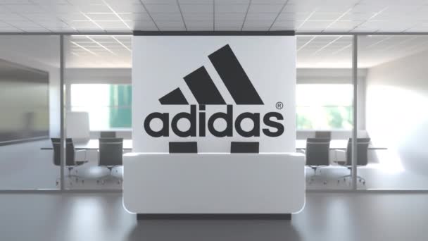 Logotipo de ADIDAS en una pared en la oficina moderna, animación conceptual editorial 3D — Vídeo de stock