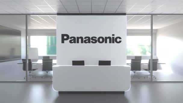現代オフィスの壁にパナソニックのロゴ,編集の概念3Dアニメーション — ストック動画