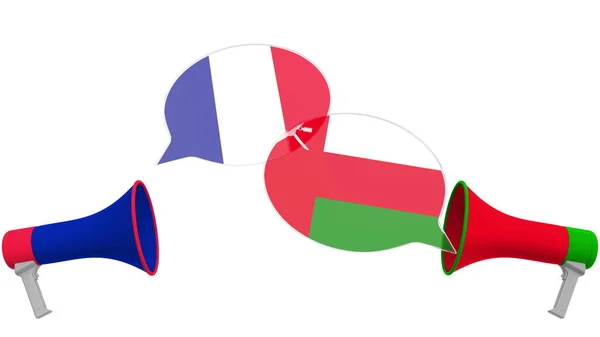 Banderas de Omán y Francia en globos del habla de megáfonos. Diálogo intercultural o charlas internacionales relacionadas con la representación 3D —  Fotos de Stock