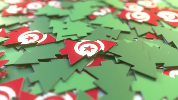Detalles de la bandera de Túnez en los árboles de Navidad de papel. Vacaciones de invierno animación 3D relacionada — Vídeo de stock