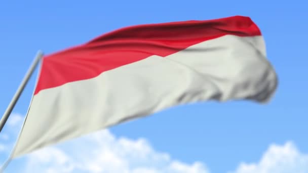 Zwaaiende vlag van Indonesië, laag hoekzicht. Loopbare realistische slow motion 3d animatie — Stockvideo