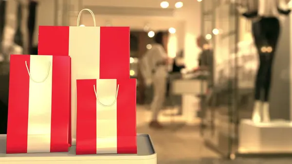 Vlag van Oostenrijk op de papieren boodschappentassen tegen wazige winkelingang. Retailgerelateerde 3d-rendering — Stockfoto