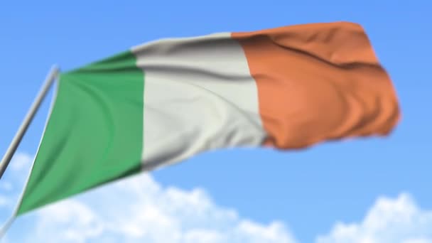 Flying national flag of the Republic of Ireland, low angle view. Loopable realistic slow motion 3D animation — Stock Video