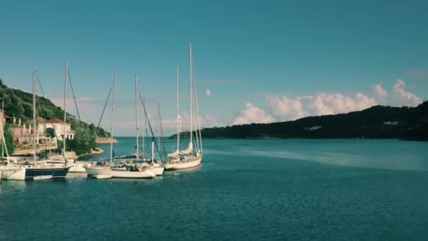 Aerial shot of docked sailing boats and the Kioni Bay. Ithaca Island, Greece — Stock Video
