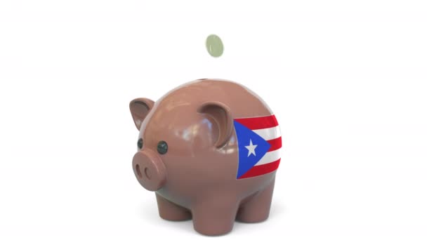 Putting money into piggy bank with flag of Puerto Rico. Tax system system or savings related conceptual 3D animation — Stock Video