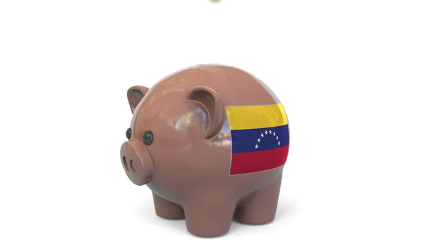 Putting money into piggy bank with flag of Venezuela. Tax system system or savings related conceptual 3D rendering — Stock Photo, Image