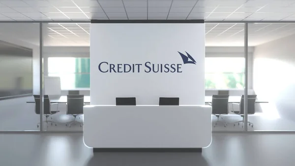 Credit Suisse logotyp ovanför receptionen i det moderna kontoret, redaktionell konceptuell 3D-rendering Royaltyfria Stockbilder
