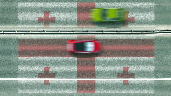 Vue aérienne du haut vers le bas des voitures et le drapeau de la Géorgie sur la route. Voyage lié rendu 3D conceptuel — Photo