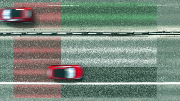 Bovenaanzicht vanuit de lucht van auto 's en de vlag van de Verenigde Arabische Emiraten Uae op de weg. Reisgerelateerde conceptuele 3d-weergave — Stockfoto