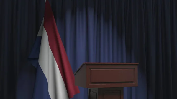 Bandera nacional de los Países Bajos y tribuna hablante del podio. Evento político o declaración relacionada con la representación conceptual 3D —  Fotos de Stock