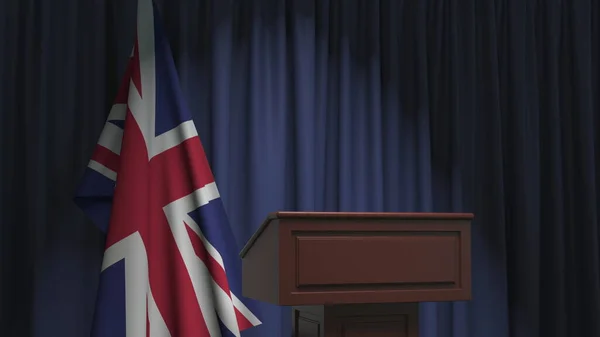 Флаг Великобритании и трибуна спикера. Политическое событие или заявление, связанное с концептуальным 3D рендерингом — стоковое фото