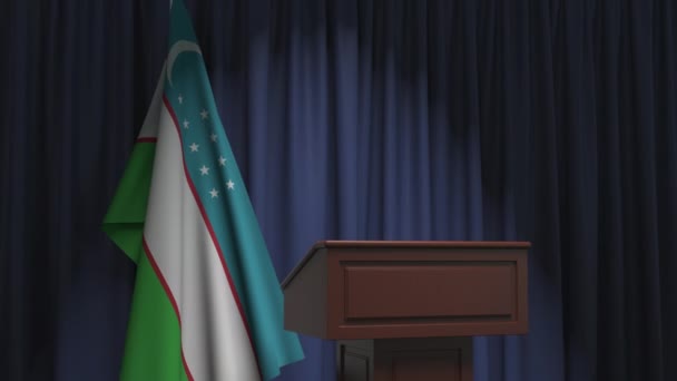 Vlag van Oezbekistan en spreker podium tribune. Politieke gebeurtenis of statement gerelateerde conceptuele 3D-animatie — Stockvideo