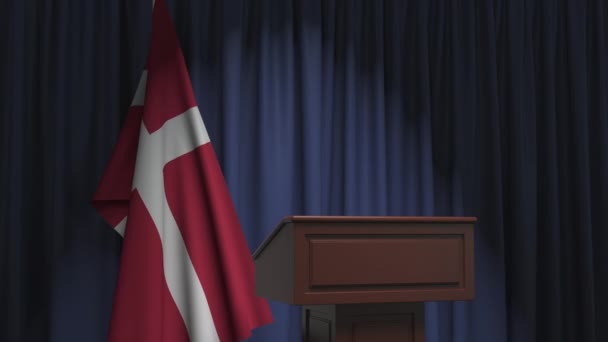 Flag of Denmark and speaker podium tribune. Political event or statement related conceptual 3D animation — Stock Video