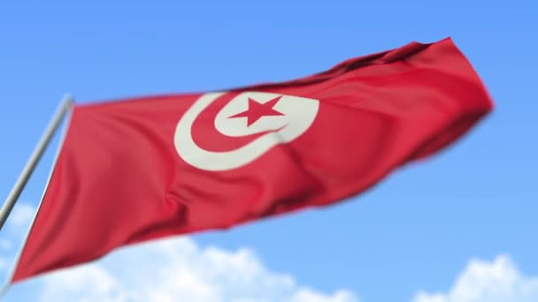 Macha flagą Tunezji, widok z niskiego kąta. Pętla realistyczny powolny ruch animacja 3d — Wideo stockowe