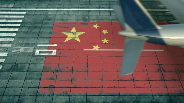 Luftaufnahme eines landenden Flugzeugs und einer chinesischen Flagge auf dem Flugplatz eines Flughafens. Luftfahrt bezogene konzeptionelle 3D-Darstellung — Stockfoto
