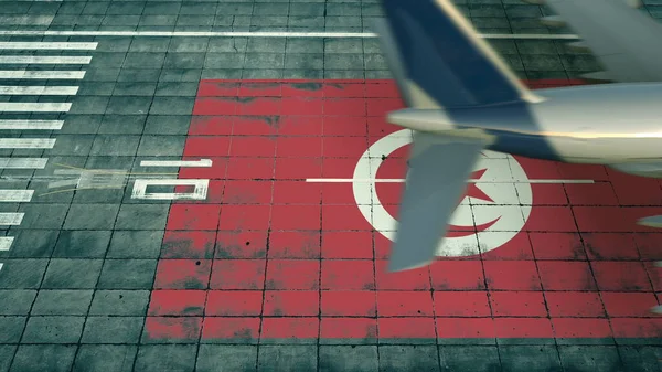 Flygfoto över ett landningsflygplan och Tunisiens flagga på en flygplats. Begreppsmässig 3d-tolkning i samband med flygresor — Stockfoto