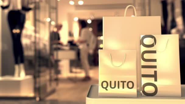 Torby papierowe z tekstem Quito. Zakupy w Ekwadorze związane z animacją 3D — Wideo stockowe