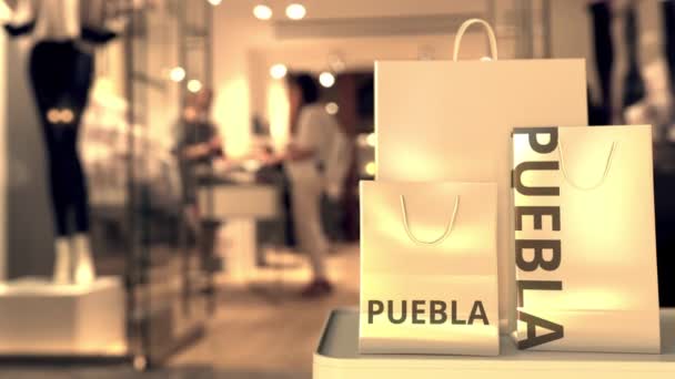 Bags with Puebla text. Shopping in Mexico related 3D animation — Stock Video