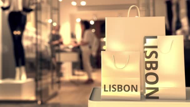 Bags with Lisbon text. Shopping in Portugal related conceptual 3D animation — ストック動画