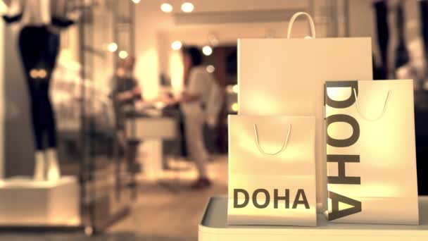 Torby na zakupy z tekstem z Doha. Zakupy w Katarze związane z animacją 3D — Wideo stockowe