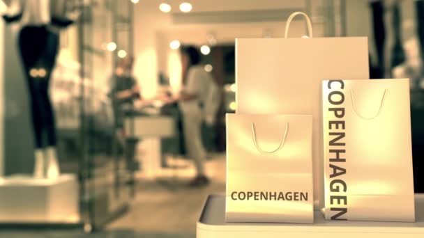 コペンハーゲンテキスト付きショッピングバッグ。デンマークでのショッピング関連の3Dアニメーション — ストック動画