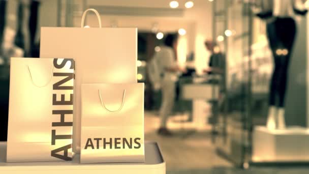 Papierowe torby z tekstem Aten. Zakupy w Grecji związane z animacją 3D — Wideo stockowe